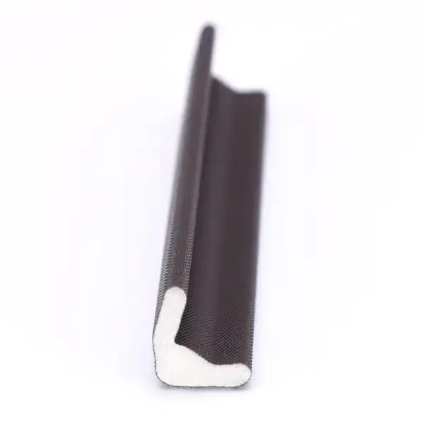 Close-up of a black door seal with a white foam core, used for insulation and sealing gaps in doors.