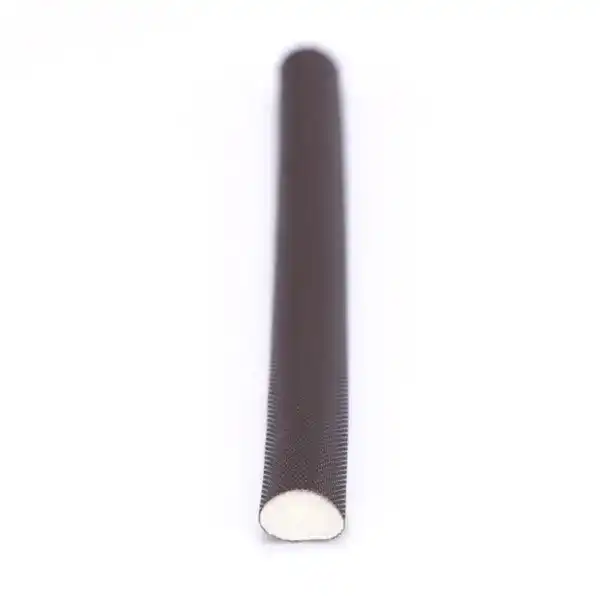 Close-up of a chalkboard duster used for cleaning blackboards and surfaces, featuring a long handle and soft dusting head.