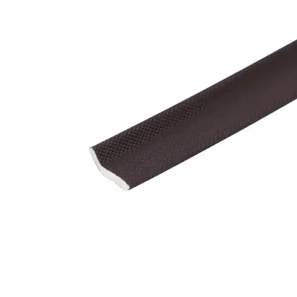 Close-up of black rubber edge trim with textured surface, used for sealing or finishing edges in construction or automotive applications.