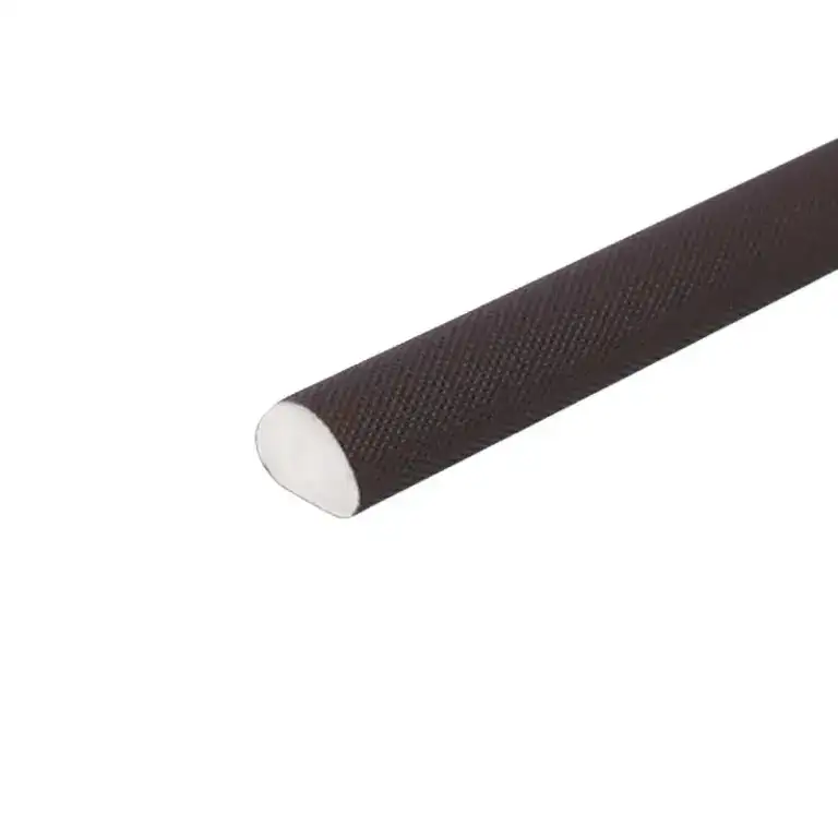 Close-up of a black textured rubber grip, cylindrical shape, suitable for tools or sports gear, on a white background.
