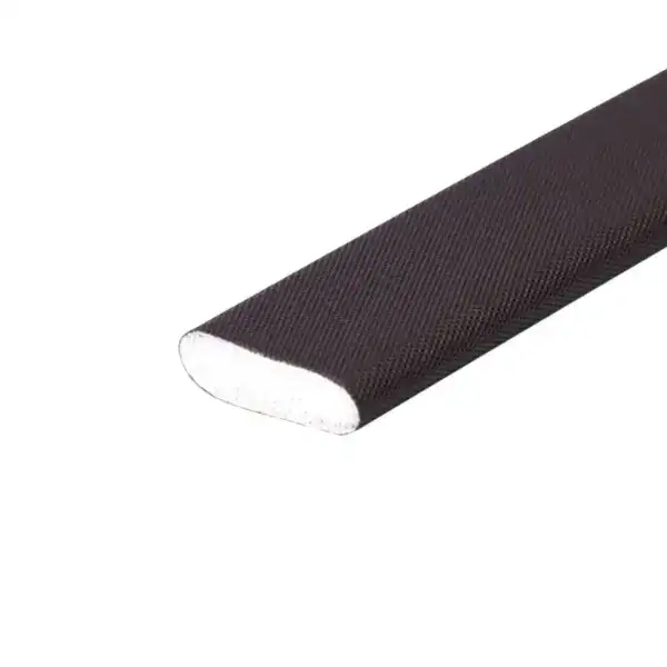 Close-up of a nail file with a black textured grip and a white abrasive surface, ideal for manicures and pedicures.