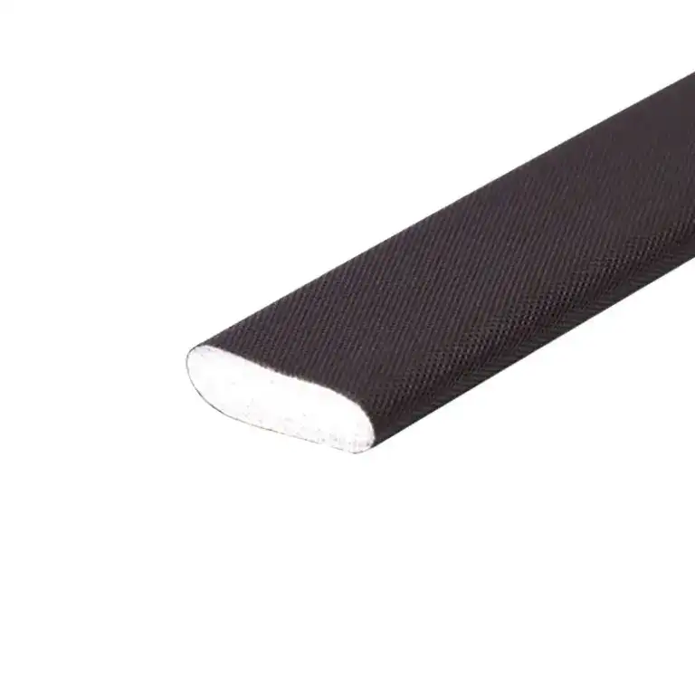 Close-up of a nail file with a black textured grip and a white abrasive surface, ideal for manicures and pedicures.