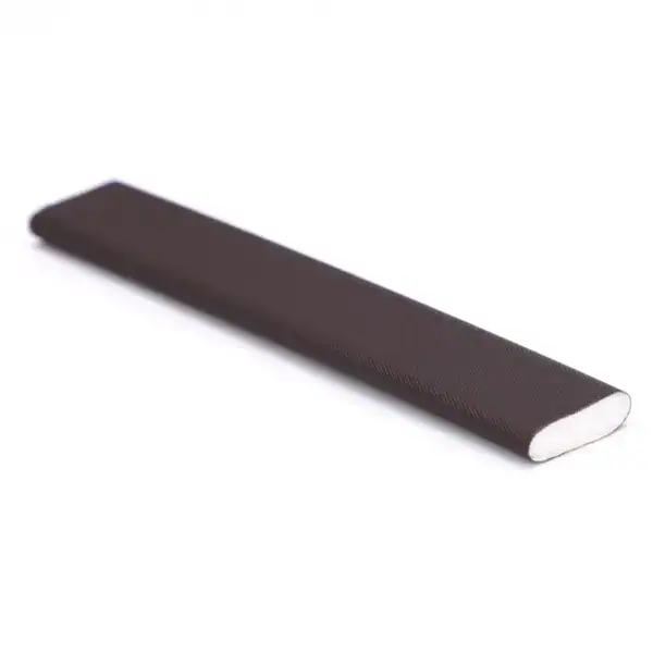 Wireless Bluetooth speaker with fabric cover, compact design, and white base for portable audio experience.