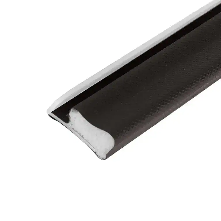Close-up of a black and white door seal strip with textured surface for insulation and sealing.
