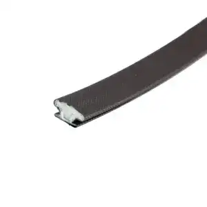 Close-up of a black rubber car door edge protector strip with a textured surface and foam backing for cushioning and protection.