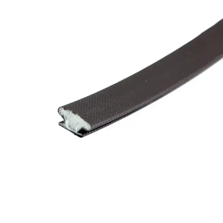 Close-up of a black rubber car door edge protector strip with a textured surface and foam backing for cushioning and protection.