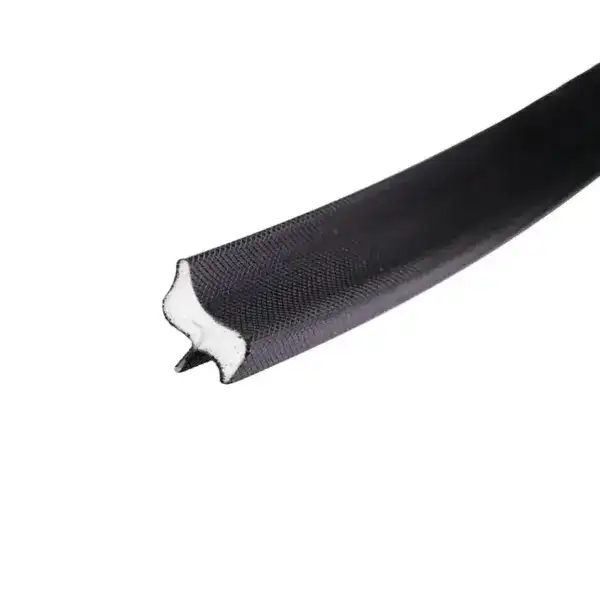 Close-up of a black sealing strip with a white interior, designed for sealing applications in industrial settings.