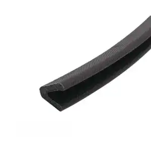 Close-up of black rubber edge trim, used for sealing and finishing edges in automotive and industrial applications.