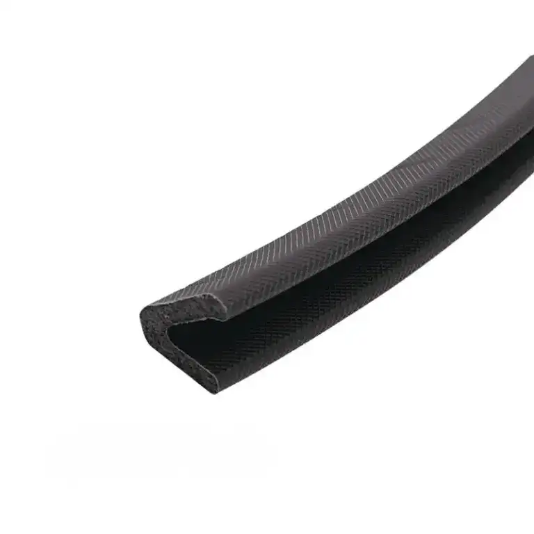 Close-up of black rubber edge trim, used for sealing and finishing edges in automotive and industrial applications.