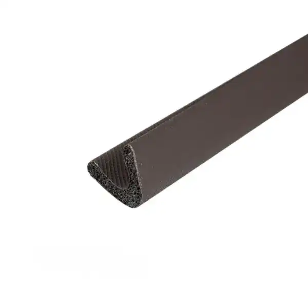 Close-up of black U-channel edge trim used for flooring or wall finishing, made of durable material with a textured surface.