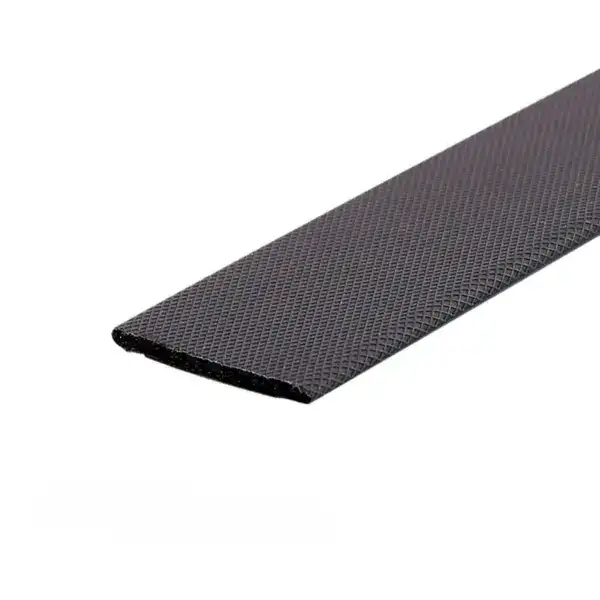 Close-up of a black rubber conveyor belt with textured surface for industrial use.