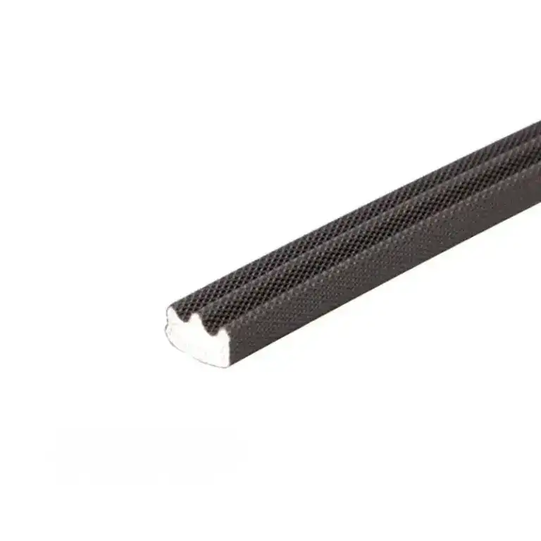 Close-up of black rubber edge trim with textured surface, used for sealing or finishing edges in construction or automotive applications.