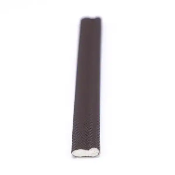 Close-up of a magnetic nail file used for manicure and pedicure, featuring a textured surface for shaping and smoothing nails.