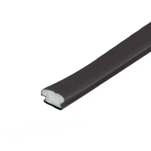 Close-up of a carbon fiber bicycle handlebar with a white interior core, showcasing lightweight and durable material for high-performance cycling.