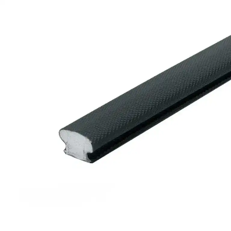 Close-up of black textured bicycle handlebar tape with a white core, designed for grip and comfort during cycling.