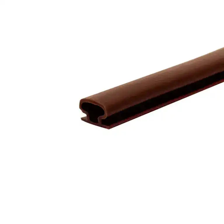 Close-up of a brown rubber seal strip used for sealing doors and windows, providing insulation and preventing drafts.