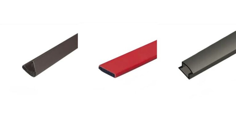 Close-up of fireproof sealing gaskets made from expanded graphite in black, red, and gray colors, used for smoke isolation and fire prevention in industrial settings.